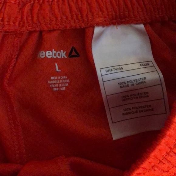 Orange boys Reebok shorts - Picture 2 of 2